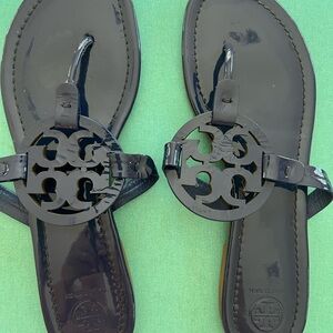 Tory Burch Patent navy flip flops - size 10.5 M.